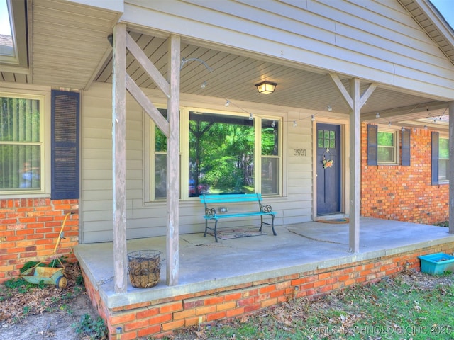 3931 S Oswego Ave, Tulsa, OK 74135 - view of patio / terrace featuring a porch