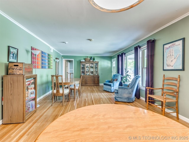 3931 S Oswego Ave, Tulsa, OK 74135 - dining room featuring ornamental molding, wood finished floors, and baseboards