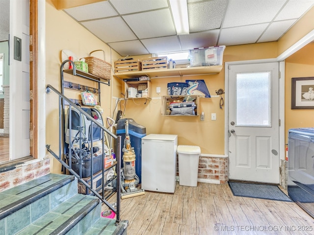 3931 S Oswego Ave, Tulsa, OK 74135 - laundry area with wood finished floors