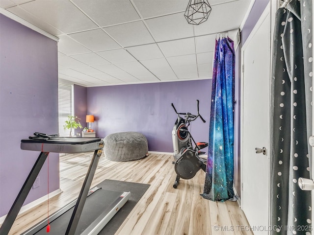 3931 S Oswego Ave, Tulsa, OK 74135 - workout area with a drop ceiling and wood finished floors