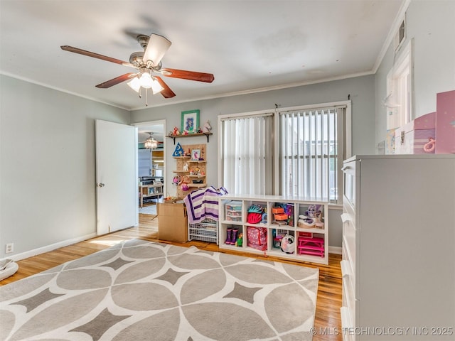 3931 S Oswego Ave, Tulsa, OK 74135 - rec room featuring light wood-style flooring, a ceiling fan, ornamental molding, and baseboards