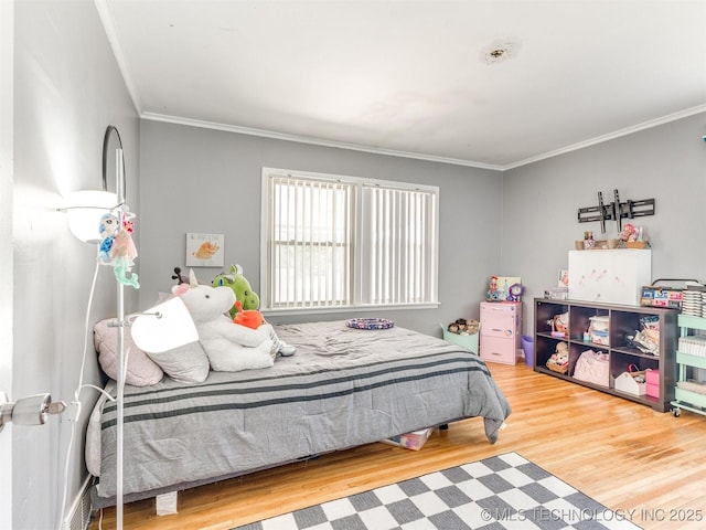3931 S Oswego Ave, Tulsa, OK 74135 - bedroom featuring wood finished floors and crown molding