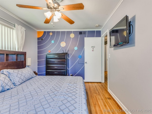 3931 S Oswego Ave, Tulsa, OK 74135 - bedroom with ornamental molding, wood finished floors, a ceiling fan, and baseboards