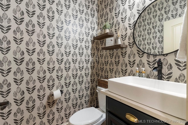 9475 E 107th Pl S, Bixby, OK 74133 - bathroom featuring wallpapered walls, toilet, and vanity