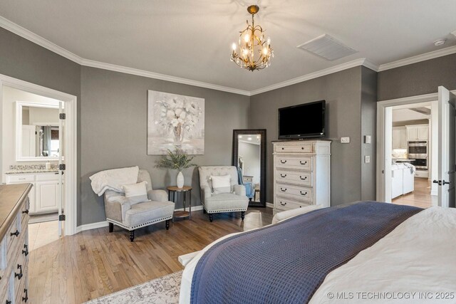 9475 E 107th Pl S, Bixby, OK 74133 - bedroom featuring a chandelier, ornamental molding, light wood-style flooring, baseboards, and connected bathroom