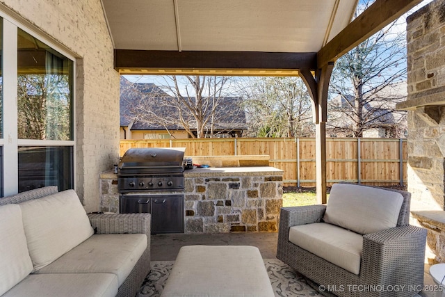 9475 E 107th Pl S, Bixby, OK 74133 - view of patio / terrace with area for grilling, a fenced backyard, and an outdoor hangout area