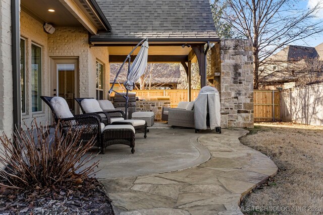 9475 E 107th Pl S, Bixby, OK 74133 - view of patio featuring a fenced backyard, an outdoor hangout area, and area for grilling
