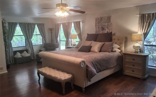 5328 Monroe Rd, Kingston, OK 73439 - bedroom featuring dark wood-style floors and a ceiling fan