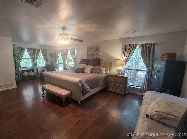 5328 Monroe Rd, Kingston, OK 73439 - bedroom featuring dark wood-style flooring and ceiling fan