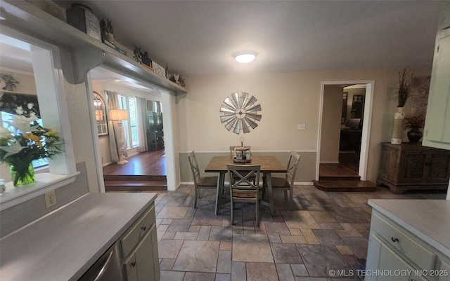5328 Monroe Rd, Kingston, OK 73439 - dining area featuring dark stone finish flooring