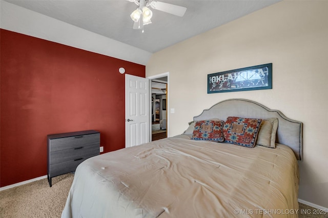 bedroom with carpet flooring, baseboards, and ceiling fan
