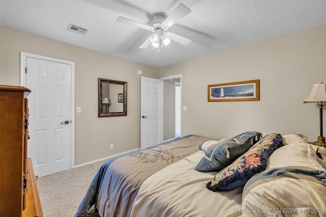 bedroom featuring baseboards and ceiling fan