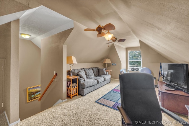 office space featuring carpet floors, lofted ceiling, and ceiling fan