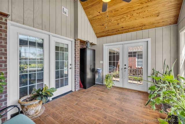 sunroom / solarium with french doors and vaulted ceiling