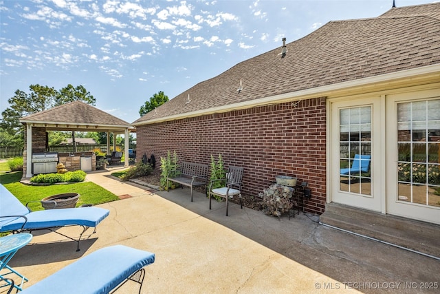 view of patio with a gazebo and area for grilling