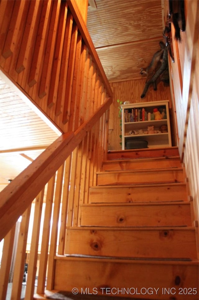 6363 S Brewer Rd, Kiowa, OK 74553 - staircase with wood walls
