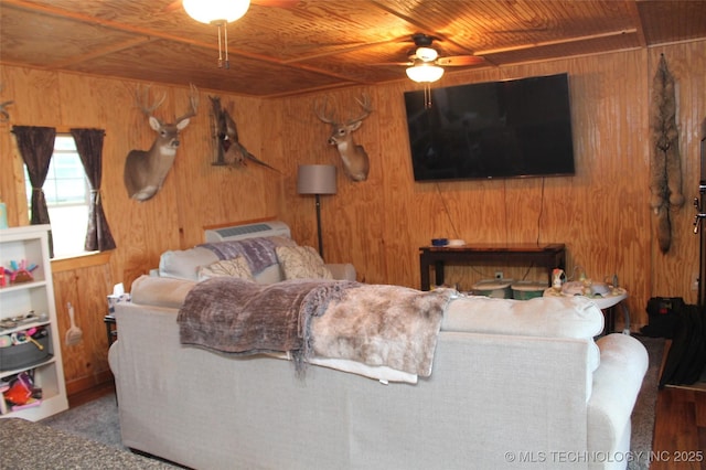 6363 S Brewer Rd, Kiowa, OK 74553 - living room with wooden ceiling, wood walls, and ceiling fan