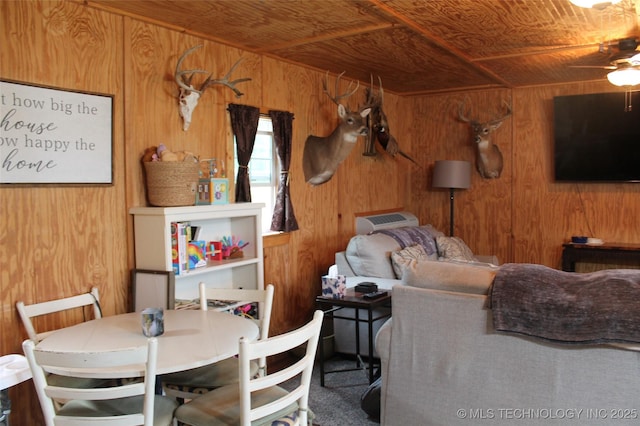 6363 S Brewer Rd, Kiowa, OK 74553 - dining area with wood walls, a ceiling fan, and wood ceiling