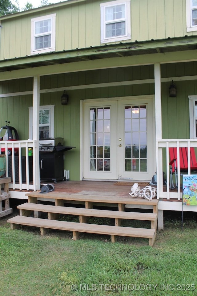 6363 S Brewer Rd, Kiowa, OK 74553 - entrance to property with french doors and covered porch