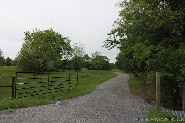 6363 S Brewer Rd, Kiowa, OK 74553 - view of dirt / gravel road featuring a gate