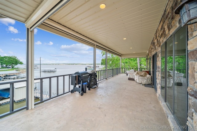 441 Ramey St, Eucha, OK 74342 - view of patio / terrace with a water view