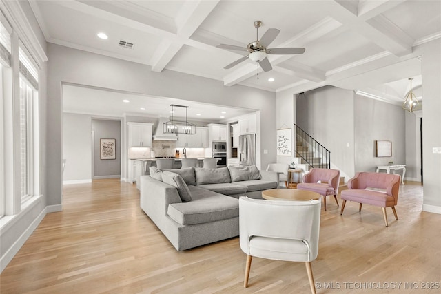 12113 S Fulton Ave E, Bixby, OK 74008 - living room featuring coffered ceiling, light wood-style flooring, stairs, a ceiling fan, and beam ceiling