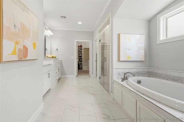 12113 S Fulton Ave E, Bixby, OK 74008 - full bathroom featuring marble finish floors, a shower stall, a walk in closet, vanity, and baseboards
