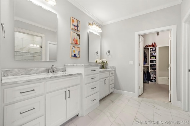 12113 S Fulton Ave E, Bixby, OK 74008 - full bath featuring marble look tiles, vanity, a walk in closet, crown molding, and baseboards