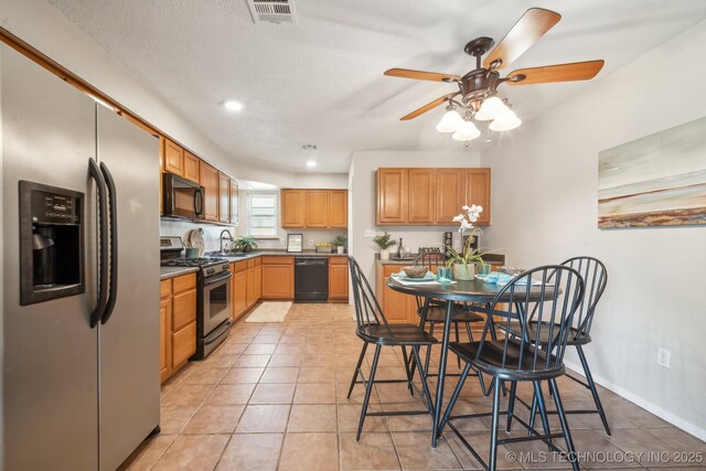 6505 E 47th St, Tulsa, OK 74145 - kitchen with black appliances, a sink, a ceiling fan, light tile patterned floors, and recessed lighting