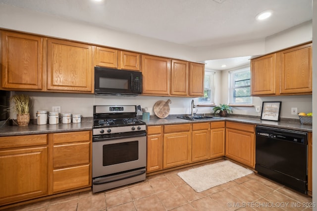 6505 E 47th St, Tulsa, OK 74145 - kitchen featuring black appliances, dark countertops, a sink, recessed lighting, and light tile patterned floors