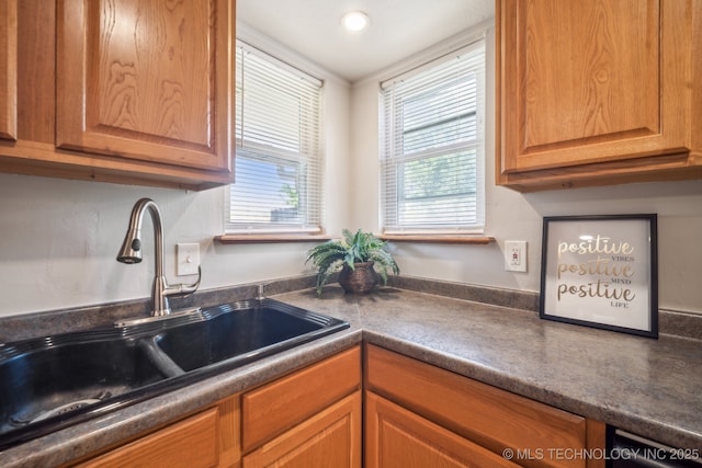 6505 E 47th St, Tulsa, OK 74145 - kitchen featuring a sink and dark countertops