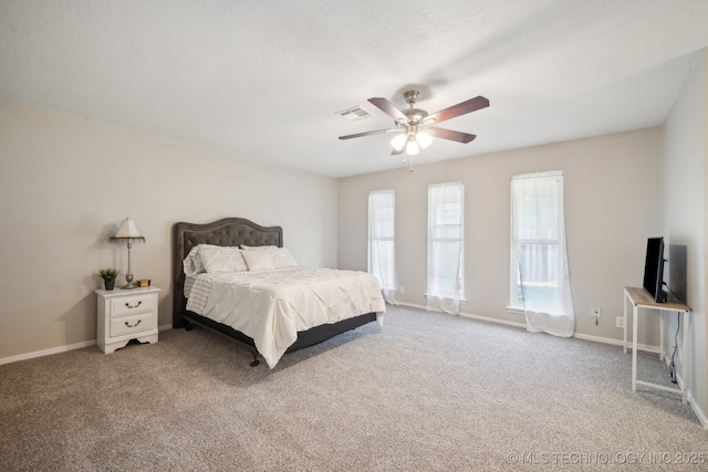 6505 E 47th St, Tulsa, OK 74145 - bedroom with light colored carpet, a ceiling fan, and baseboards