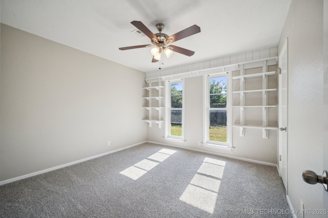 6505 E 47th St, Tulsa, OK 74145 - unfurnished room with carpet floors, baseboards, and a ceiling fan