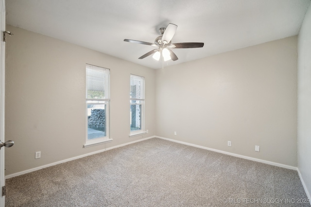 6505 E 47th St, Tulsa, OK 74145 - spare room featuring carpet, ceiling fan, and baseboards