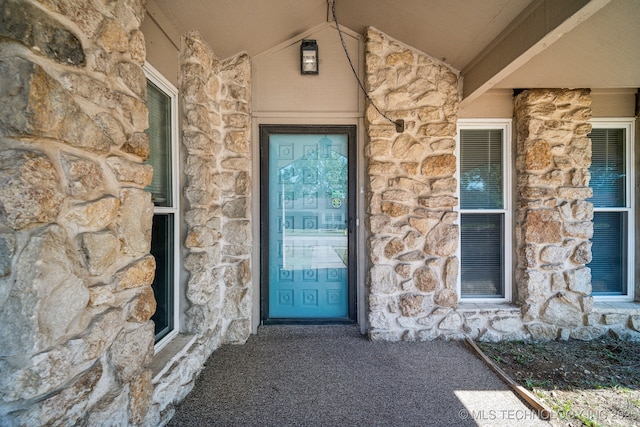 6505 E 47th St, Tulsa, OK 74145 - doorway to property with stone siding