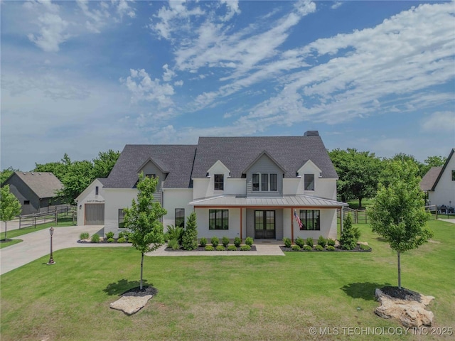 6407 N Blue Sage Dr, Owasso, OK 74055 - modern farmhouse style home featuring driveway, french doors, a standing seam roof, roof with shingles, and an attached garage