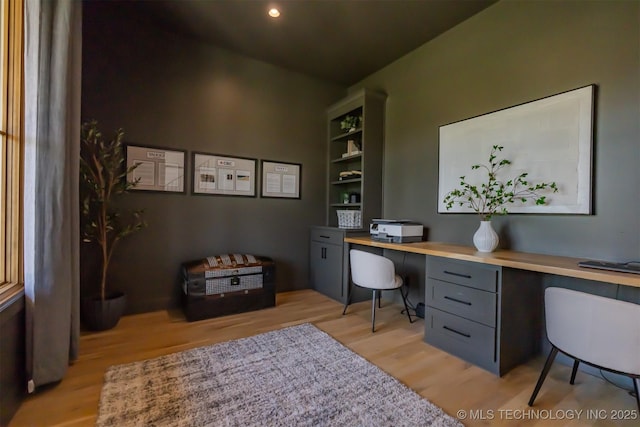 6407 N Blue Sage Dr, Owasso, OK 74055 - home office featuring light wood-style flooring and built in study area