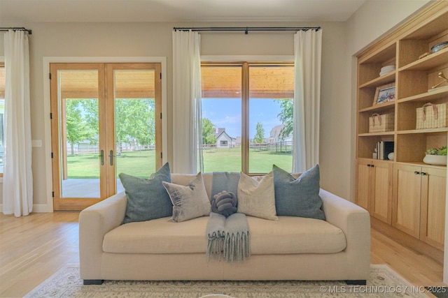 6407 N Blue Sage Dr, Owasso, OK 74055 - living room featuring light wood finished floors