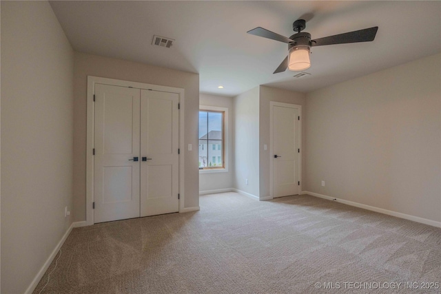 6407 N Blue Sage Dr, Owasso, OK 74055 - unfurnished bedroom with carpet, baseboards, and ceiling fan