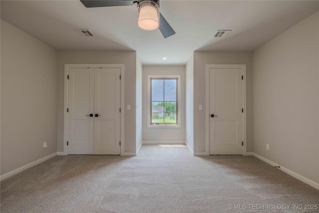 6407 N Blue Sage Dr, Owasso, OK 74055 - unfurnished bedroom with carpet floors, baseboards, and ceiling fan