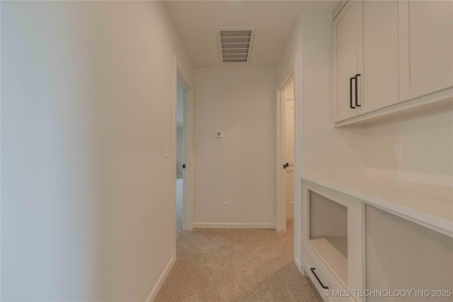 6407 N Blue Sage Dr, Owasso, OK 74055 - hall with light carpet and baseboards