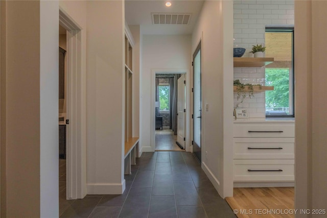 6407 N Blue Sage Dr, Owasso, OK 74055 - hall featuring baseboards and dark tile patterned flooring