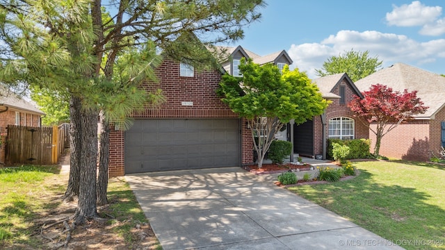 view of front of home with brick siding, driveway, and a garage