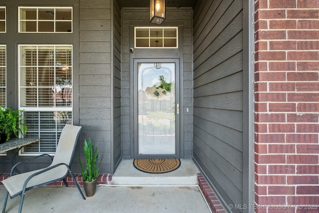 entrance to property with a porch