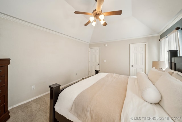 bedroom featuring vaulted ceiling, carpet flooring, ceiling fan, crown molding, and baseboards