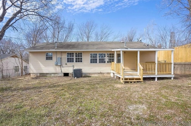 233 N 44th W Ave, Tulsa, OK 74127 - rear view of house featuring central AC unit and a wooden deck