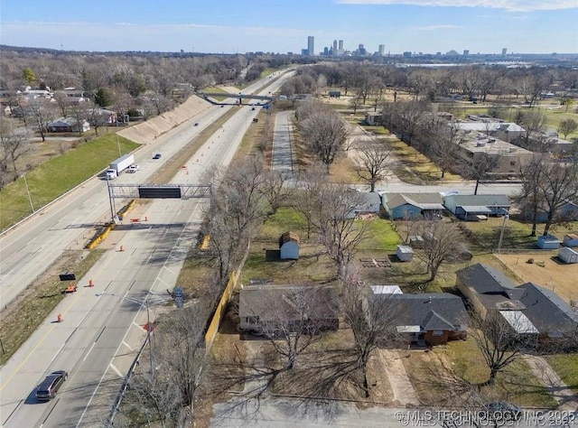 233 N 44th W Ave, Tulsa, OK 74127 - aerial overview of property's location with a skyline view