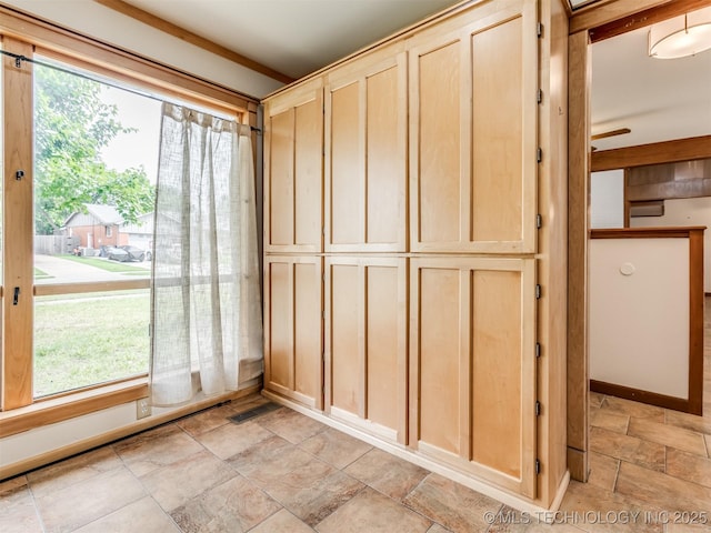 7446 E 20th St, Tulsa, OK 74112 - unfurnished sunroom with plenty of natural light