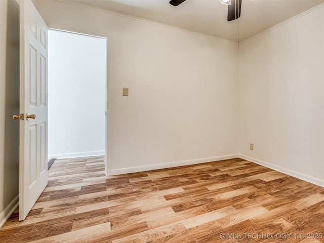 7446 E 20th St, Tulsa, OK 74112 - empty room with crown molding, a ceiling fan, light wood-type flooring, and baseboards