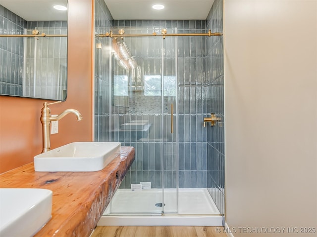 7446 E 20th St, Tulsa, OK 74112 - bathroom with a shower stall and double vanity